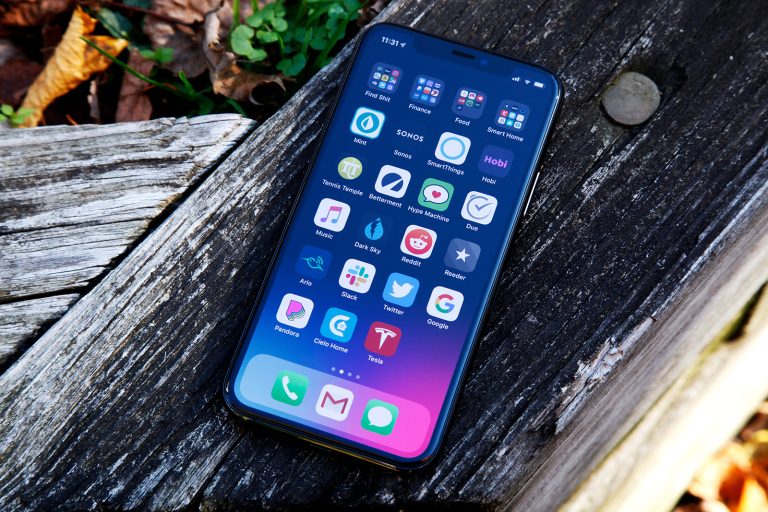 iPhone 11 Pro with the screen on.