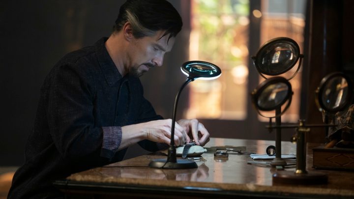 Doctor Strange (Benedict Cumberbatch) repairing his watch in a new still from Multiverse of Madness