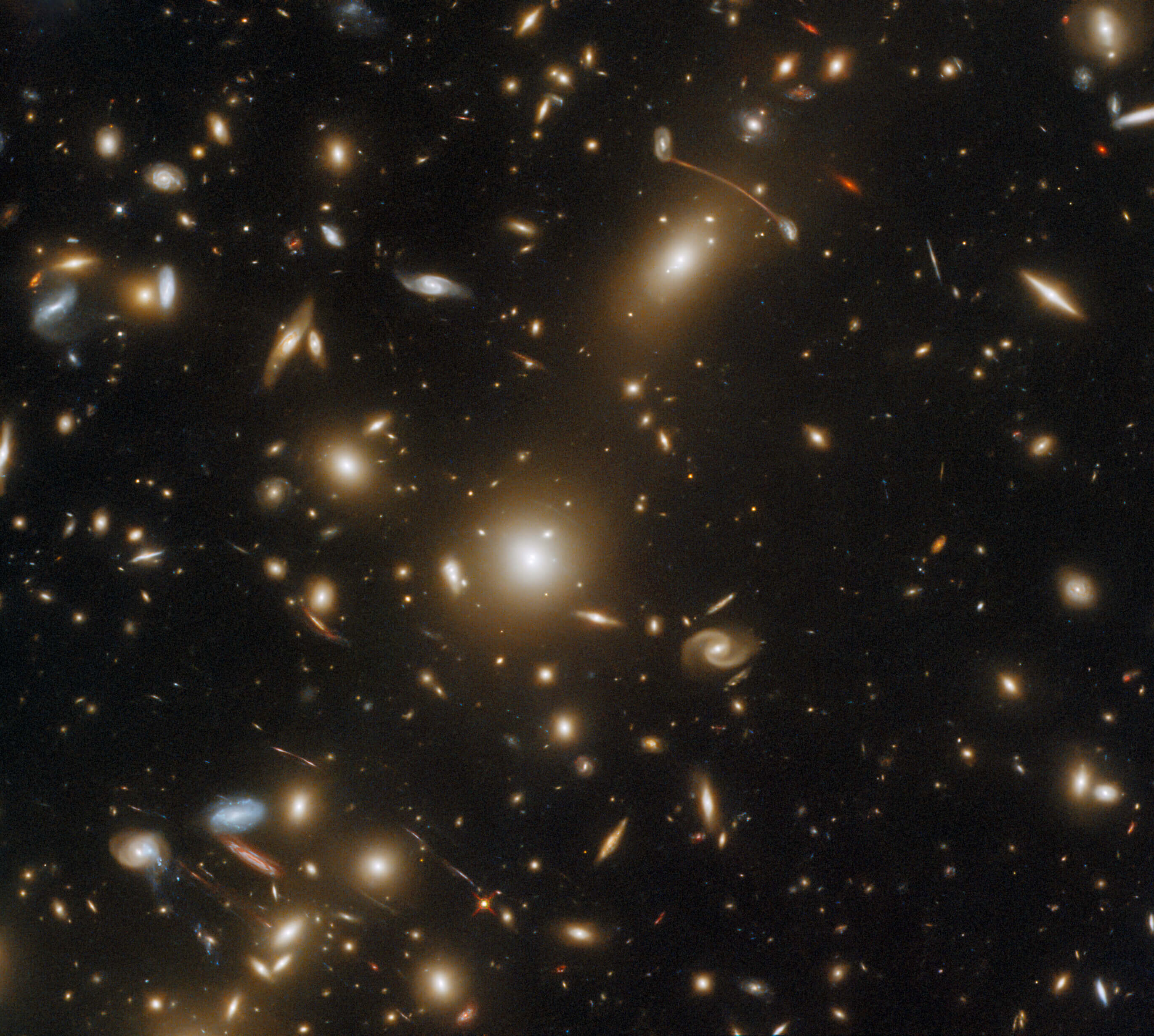 massive galaxy cluster pictured by Hubble