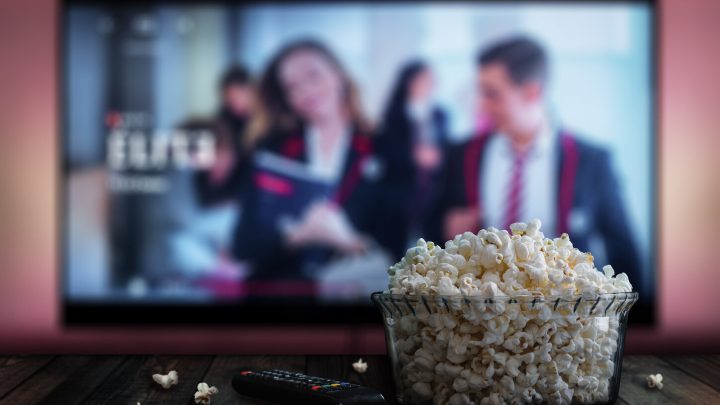 Netflix TV screen with popcorn bowl