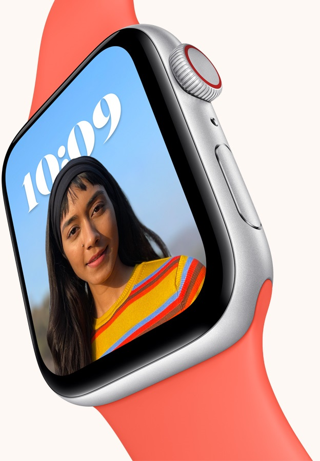 Apple Watch SE with peach coloured straps